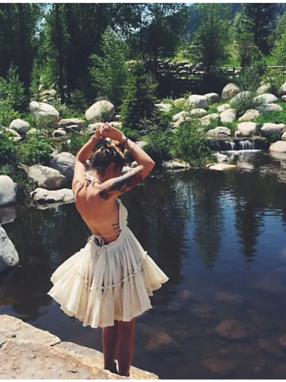 Plunging V-Neck Cream Mini Dress with Tiered Skirt